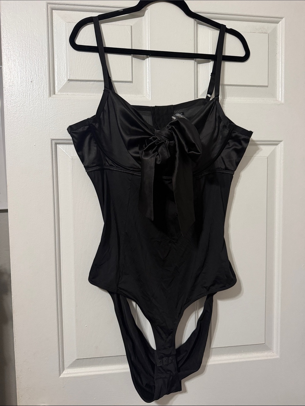 Torrid black ' One-Piece Bodysuit with Front Bow with open back